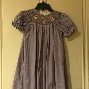 Purple and white smocked dress